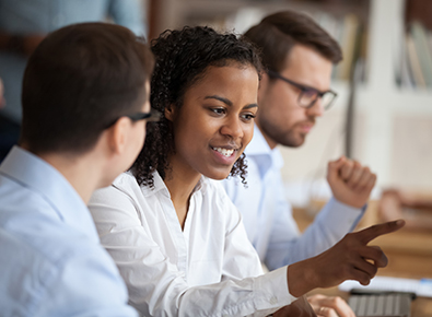 woman talking with employees