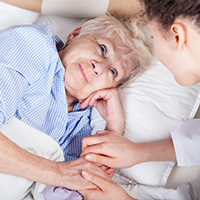 Nurse with hospice patient.