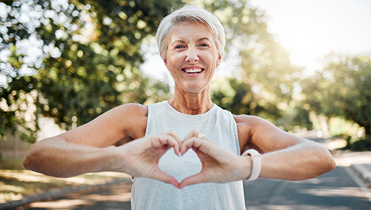 Woman making a heart with her hands