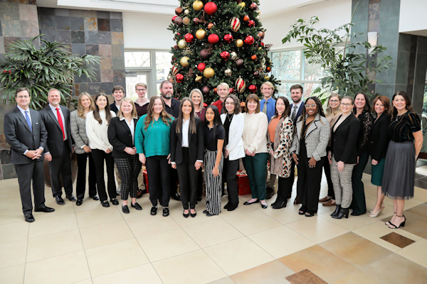 A group photo of Tanner leadership team members and attendees