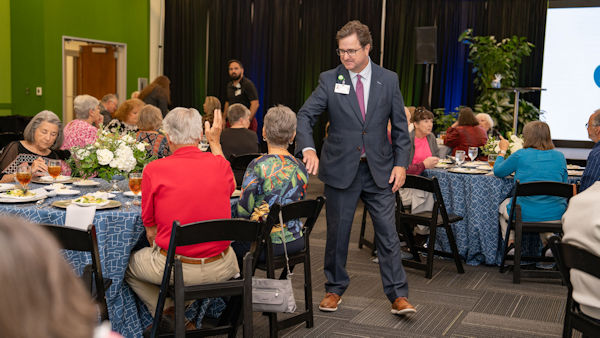 Greg Schulenburg with volunteers