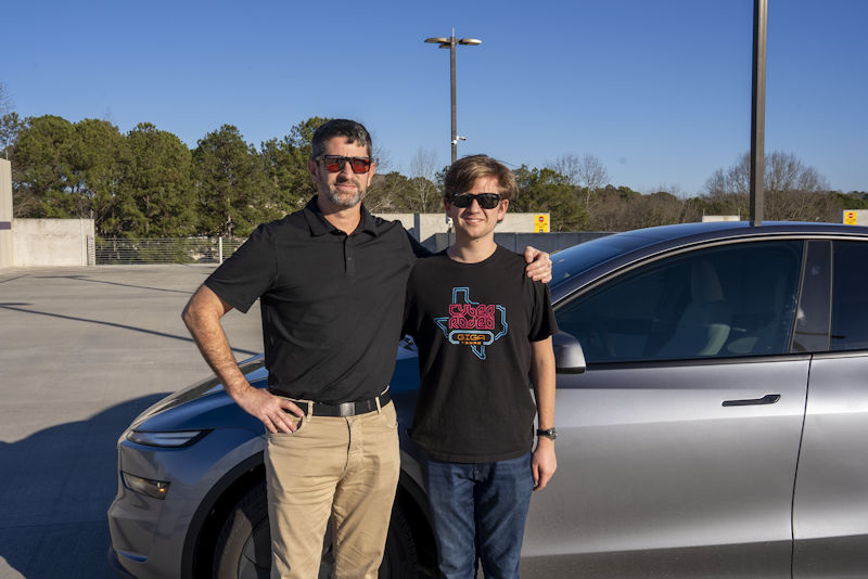 John and Jack Brandt with Tesla