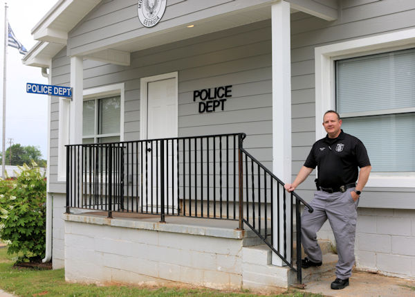 Brian Sims on steps of Mount Zion Police Department