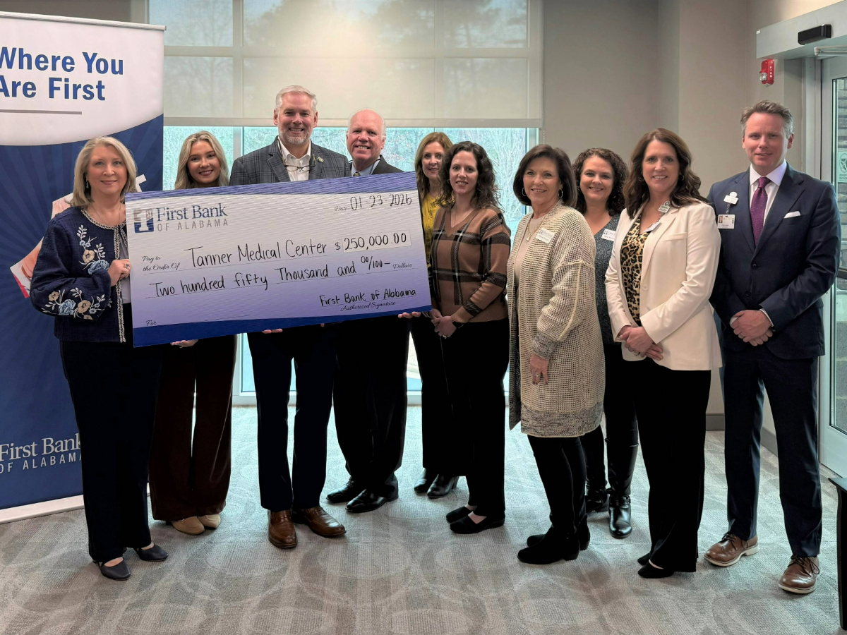 A photo of First Bank of Alabama making a contribution to the Alabama Rural Hospital Investment Program to support Tanner Medical Center/Carrollton