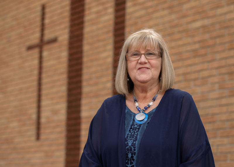 Becky Ellis, of Tallapoosa, in front of her church