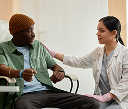Man talking to doctor